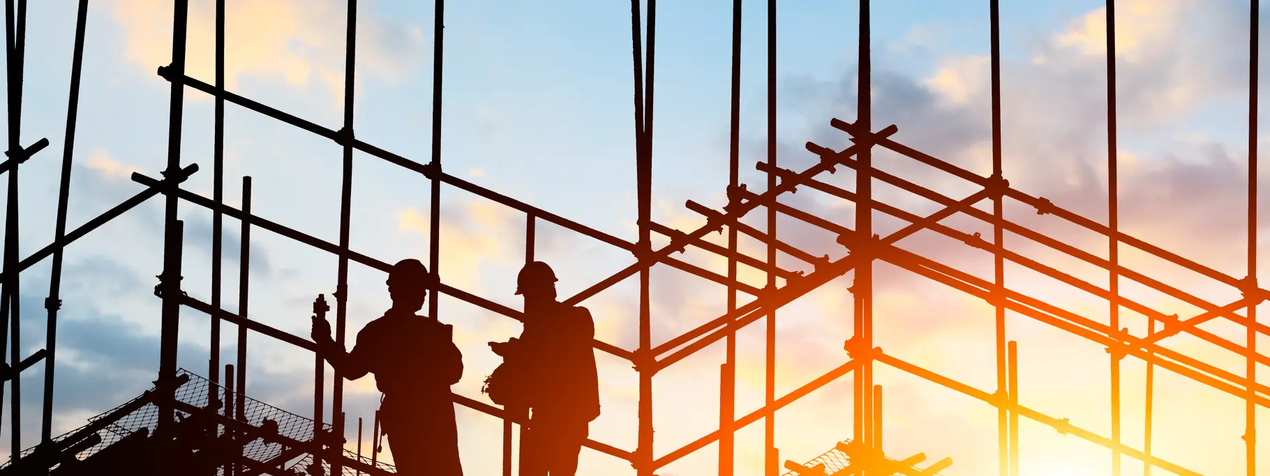 Construction Workers On Scaffolding Construction Workers On Scaffolding